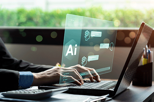 L'intelligence artificielle a une longue histoire derrière elle Un homme utilise l'IA sur son ordinateur