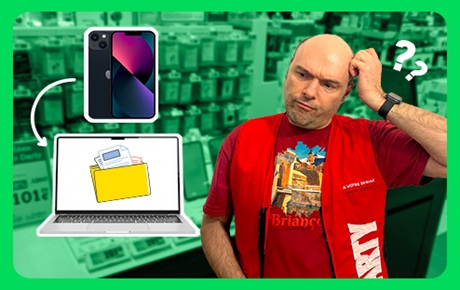 Un vendeur Darty se gratte la tête à côté d 'un iPhone et d'un mac